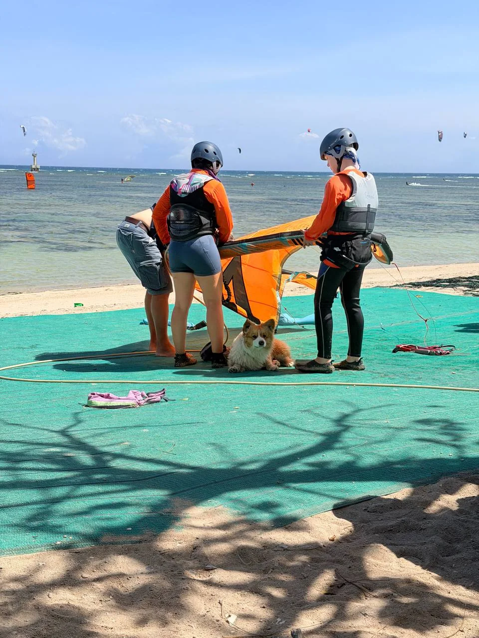 Riders preparing their equipment by My Hoa Lagoon